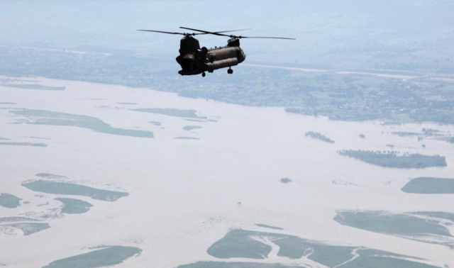 File:US Army helicopter flies over a flood-affected area of Pakistan Cut2.png