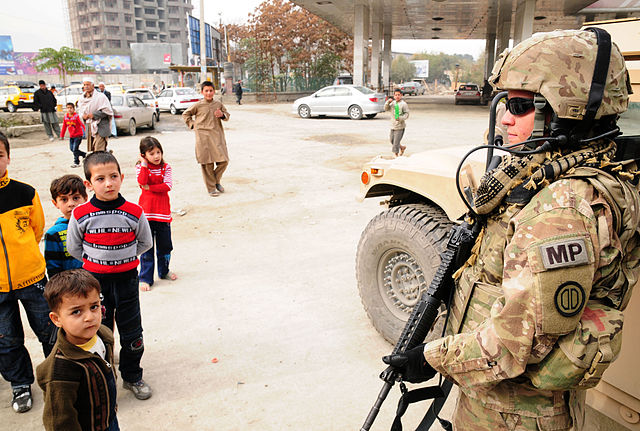 File:Local soldier mentors Afghan police in Kabul.jpg
