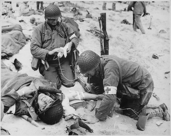 File:Medics helping injured soldier in France, 1944 - NARA - 535973.tif