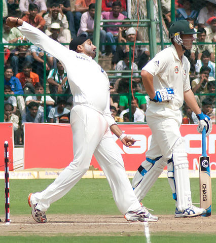 File:Harbhajan Singh bowling against Australia, October 2010.jpg