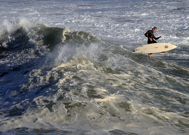 File:A surfer in the air.jpg
